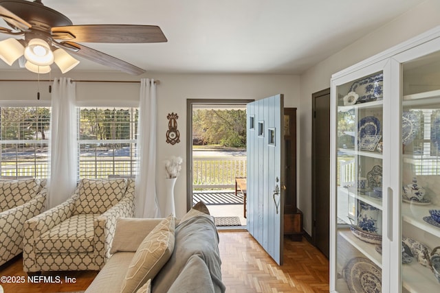 interior space featuring plenty of natural light and ceiling fan