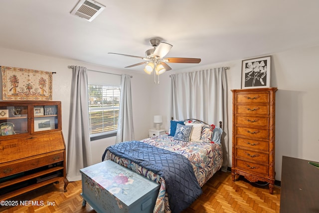 bedroom with visible vents and ceiling fan