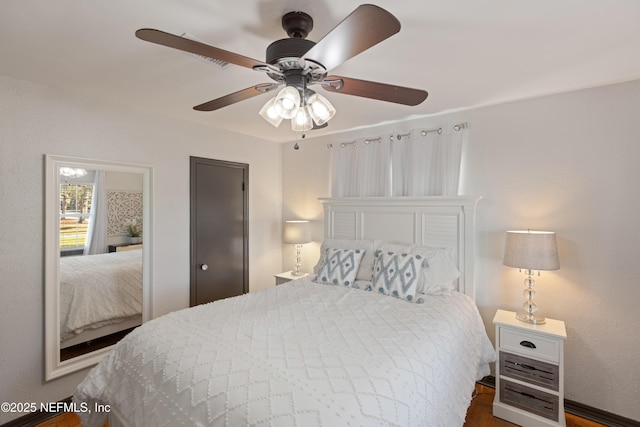 bedroom featuring ceiling fan