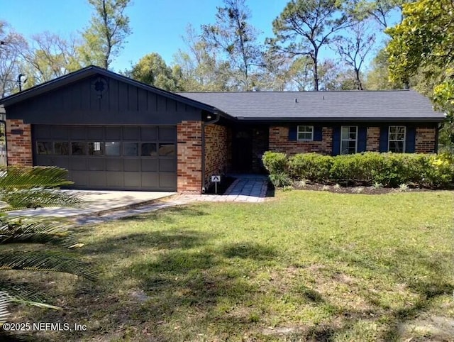 ranch-style home featuring driveway, a front lawn, brick siding, and an attached garage