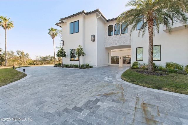 exterior space with stucco siding