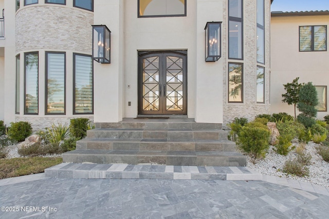 doorway to property with stucco siding