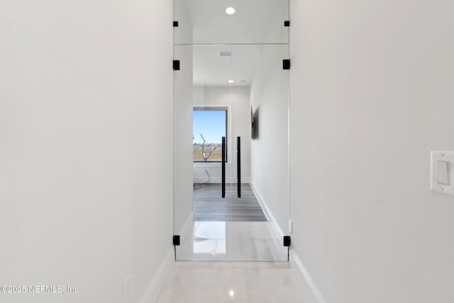 corridor with baseboards