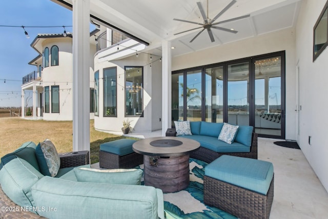 view of patio featuring an outdoor hangout area and ceiling fan