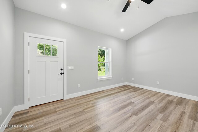 207 Palmetto Ave N, Florahome, FL 32140 - entryway featuring ceiling fan, healthy amount of natural light, lofted ceiling, light wood finished floors, and recessed lighting