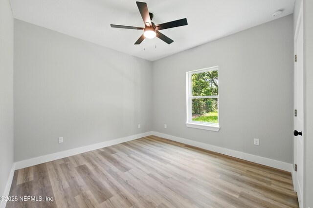 207 Palmetto Ave N, Florahome, FL 32140 - unfurnished room with light wood finished floors and baseboards