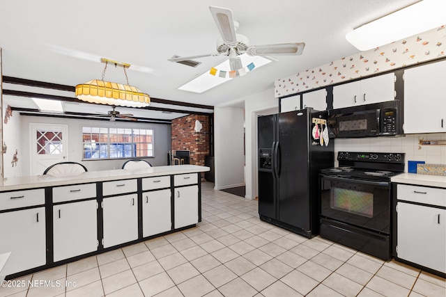 kitchen featuring white cabinetry, black appliances, light countertops, and ceiling fan