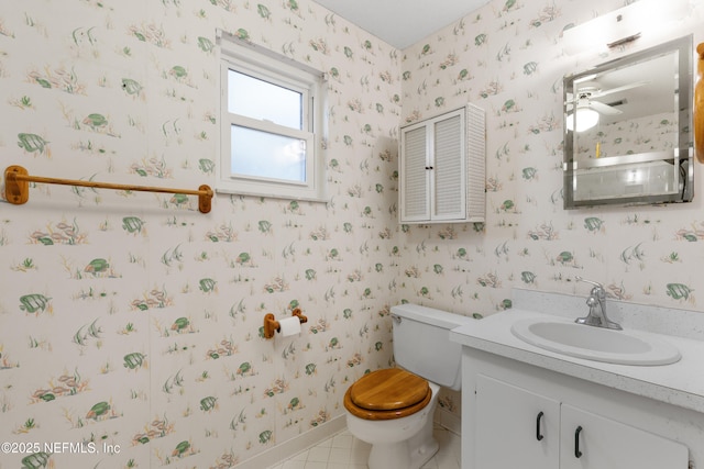 bathroom with wallpapered walls, toilet, and tile patterned flooring