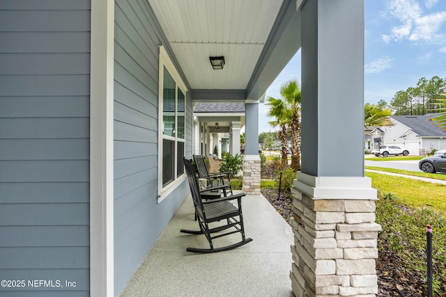 view of patio featuring a porch