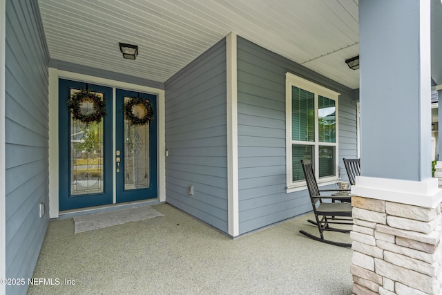 doorway to property with a porch