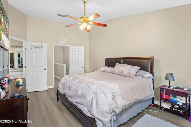 7540 Scarlet Ibis Ln, Jacksonville, FL 32256 - bedroom featuring visible vents, baseboards, wood finished floors, and a ceiling fan