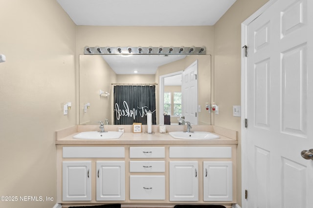 7540 Scarlet Ibis Ln, Jacksonville, FL 32256 - bathroom with double vanity and a sink
