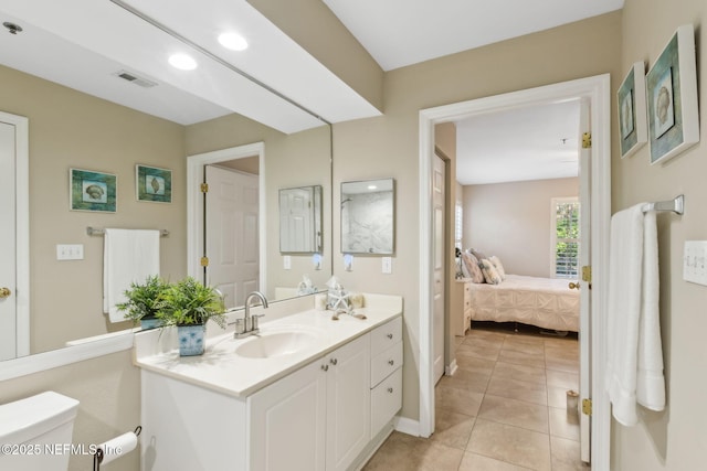 bathroom featuring visible vents, toilet, ensuite bath, tile patterned flooring, and vanity