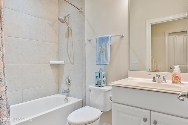 bathroom featuring shower / tub combo with curtain, vanity, and toilet