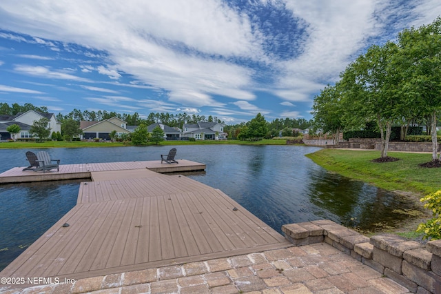 view of dock with a water view