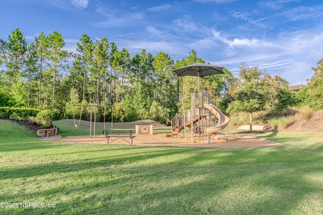 communal playground featuring a lawn