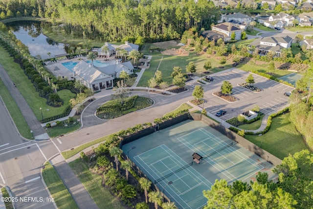 bird's eye view with a water view