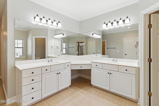 full bathroom with vanity, crown molding, and tile patterned flooring