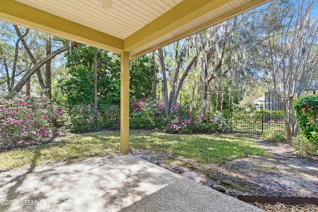 view of yard with fence and a patio area