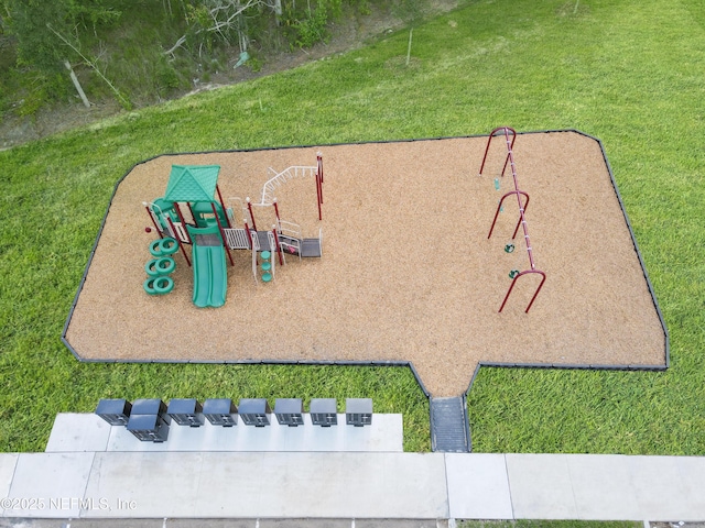 exterior space featuring a yard and playground community