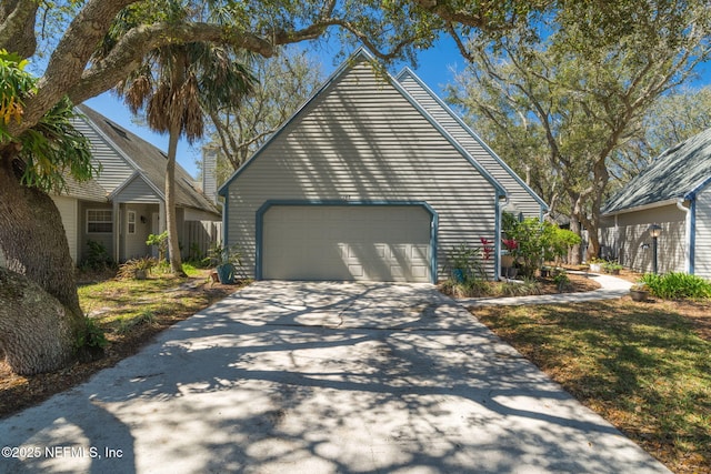 exterior space with an attached garage and driveway