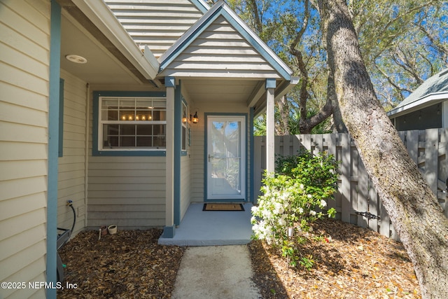 property entrance with fence