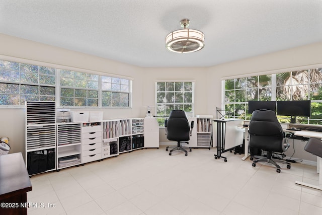 office space with a textured ceiling