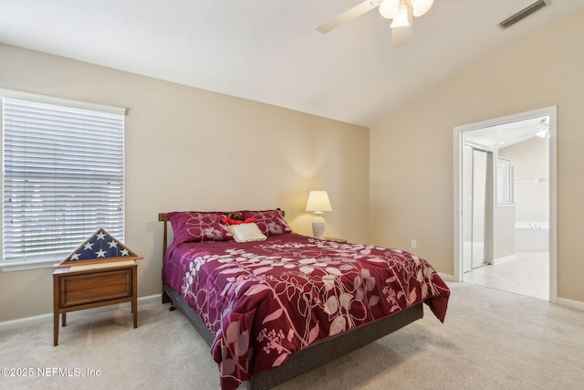 bedroom with visible vents, baseboards, carpet, and vaulted ceiling