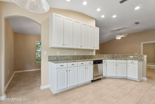 96231 Abaco Island Dr, Fernandina Beach, FL 32034 - kitchen featuring stainless steel dishwasher, ceiling fan, arched walkways, lofted ceiling, and a peninsula