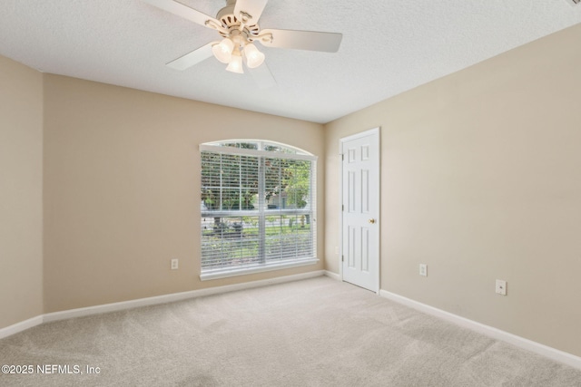 96231 Abaco Island Dr, Fernandina Beach, FL 32034 - unfurnished room featuring carpet, ceiling fan, and a textured ceiling