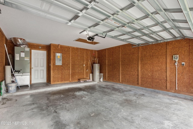 96231 Abaco Island Dr, Fernandina Beach, FL 32034 - garage featuring electric panel, a garage door opener, and water heater
