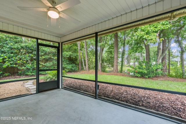 96231 Abaco Island Dr, Fernandina Beach, FL 32034 - unfurnished sunroom featuring ceiling fan