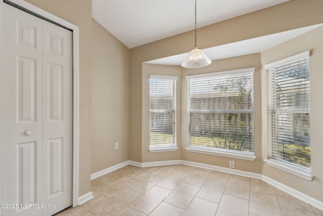 96231 Abaco Island Dr, Fernandina Beach, FL 32034 - unfurnished dining area with plenty of natural light and light tile patterned floors