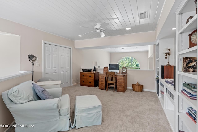 office area featuring visible vents, baseboards, carpet floors, wooden ceiling, and a ceiling fan