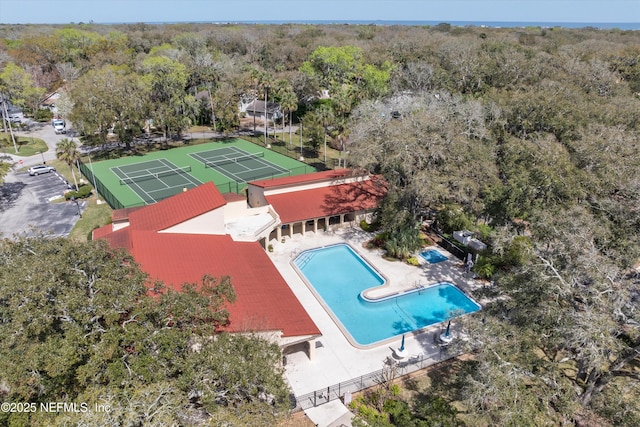 aerial view featuring a view of trees