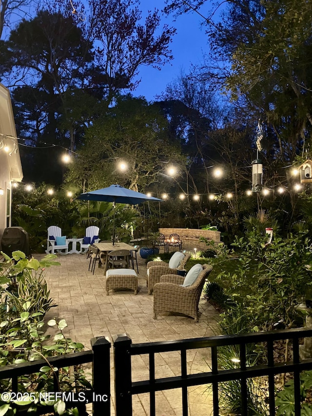 view of patio at twilight