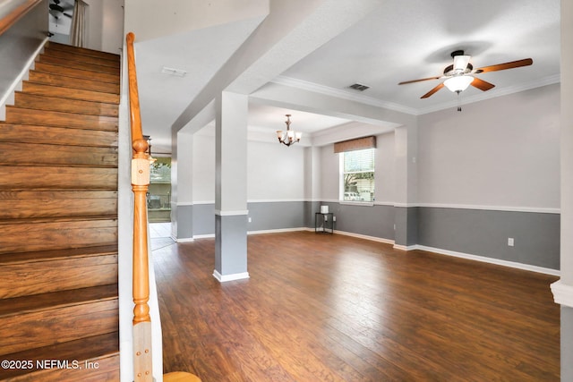 1601 Majestic View Ln, Fleming Island, FL 32003 - unfurnished living room featuring ceiling fan, wood finished floors, stairs, a chandelier, and ornamental molding