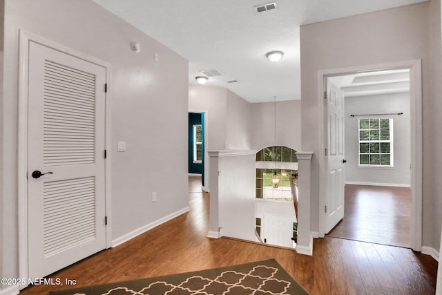 1601 Majestic View Ln, Fleming Island, FL 32003 - hallway featuring wood-type flooring and baseboards