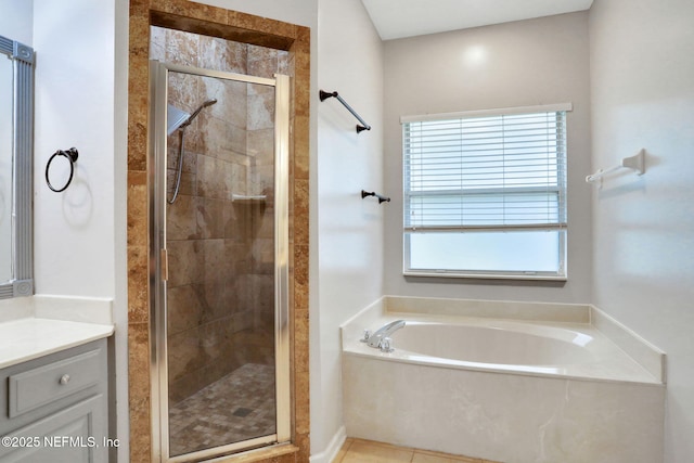 1601 Majestic View Ln, Fleming Island, FL 32003 - bathroom with a garden tub, a stall shower, and vanity