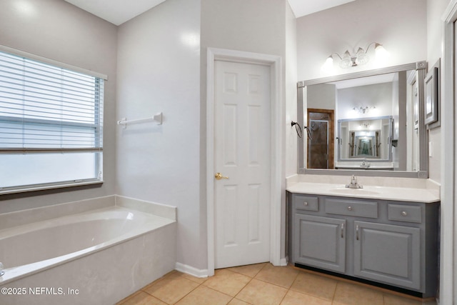 1601 Majestic View Ln, Fleming Island, FL 32003 - full bathroom featuring a garden tub, vanity, and tile patterned floors