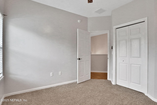 1601 Majestic View Ln, Fleming Island, FL 32003 - unfurnished bedroom featuring carpet and a closet