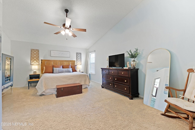 carpeted bedroom featuring high vaulted ceiling, a ceiling fan, and a textured ceiling