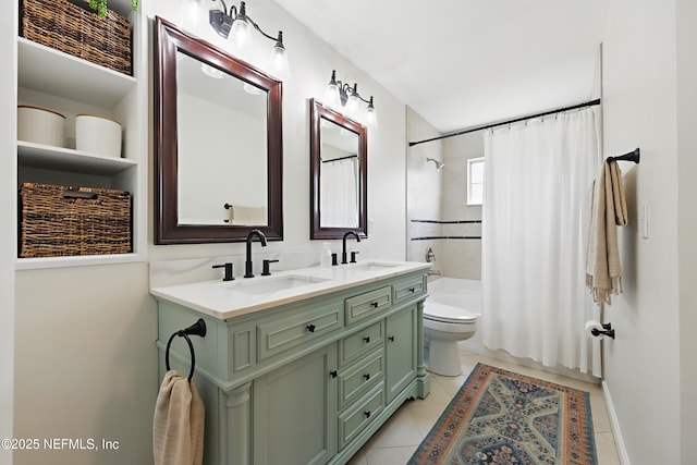 full bath featuring tile patterned floors, shower / bath combination with curtain, toilet, and a sink