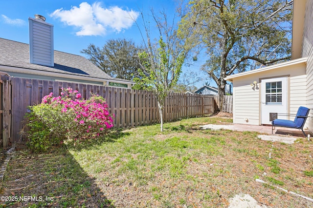 view of yard featuring a fenced backyard