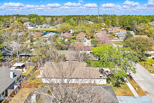 birds eye view of property with a residential view