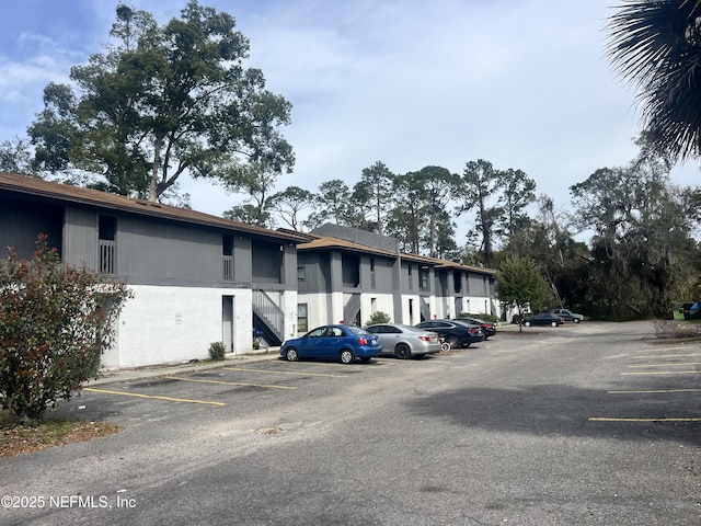 view of uncovered parking lot