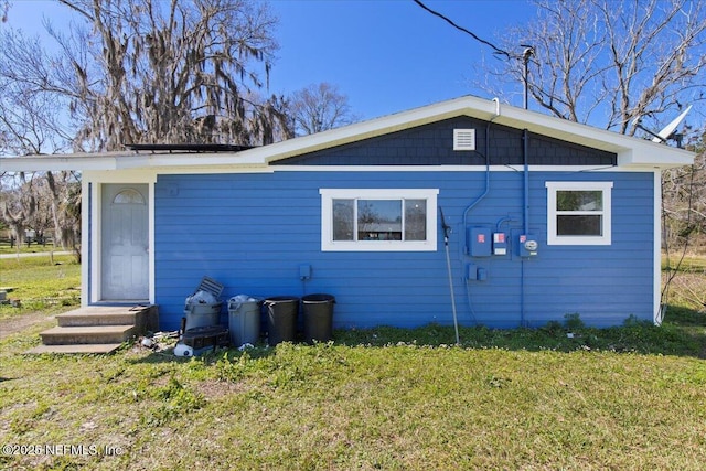 exterior space with a yard