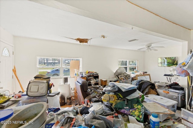 interior space featuring ceiling fan