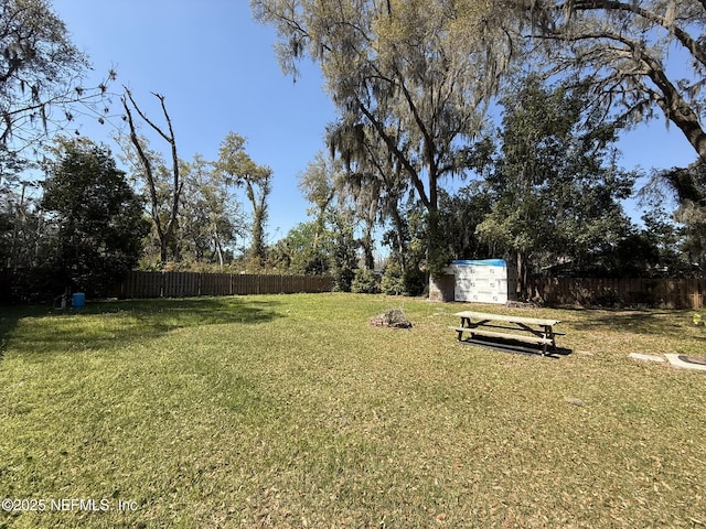 view of yard featuring fence