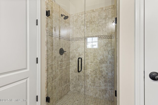 full bath featuring a stall shower